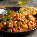 Moroccan-Inspired Country-Style Rib Ragu with Couscous Cakes